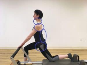 Spot the Difference  Standing Thigh Stretch - Pacific Northwest Pilates